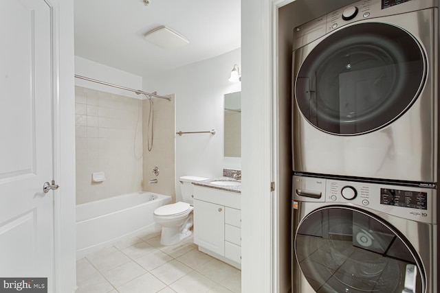 3650 S Glebe Rd Unit 239, Arlington, VA 22202 - bathroom with stacked washer / dryer, vanity, tile patterned flooring, and washtub / shower combination