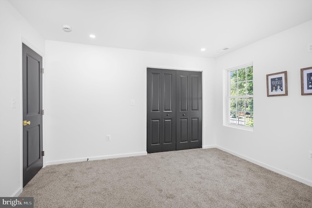 2910 Georgia Ave, Halethorpe, MD 21227 - unfurnished bedroom featuring carpet flooring, a closet, and recessed lighting