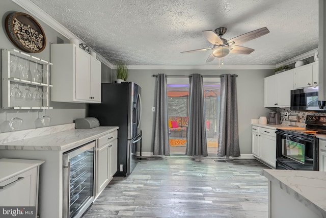 840 W Spring Meadow Ct, Edgewood, MD 21040 - kitchen with beverage cooler, appliances with stainless steel finishes, a ceiling fan, crown molding, and a textured ceiling