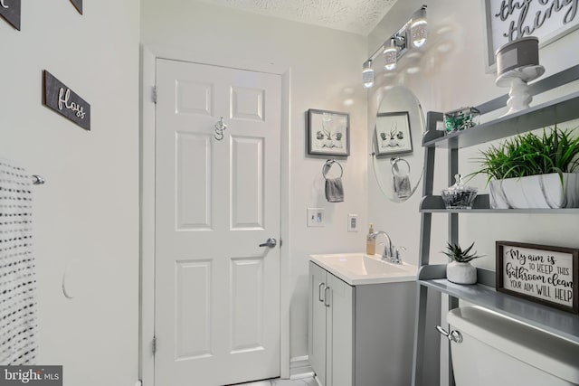 840 W Spring Meadow Ct, Edgewood, MD 21040 - bathroom with vanity and a textured ceiling