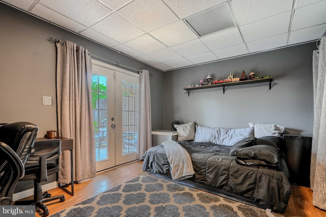 840 W Spring Meadow Ct, Edgewood, MD 21040 - bedroom with access to exterior, wood finished floors, french doors, and a paneled ceiling