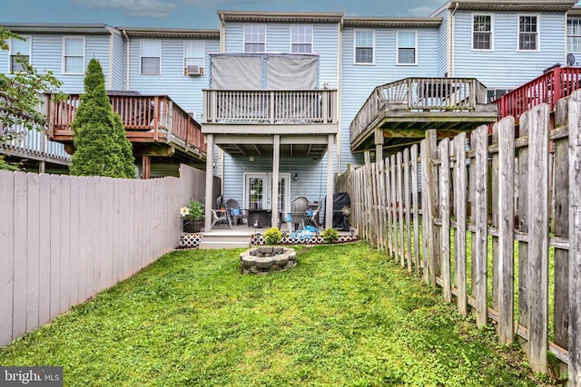 840 W Spring Meadow Ct, Edgewood, MD 21040 - back of house featuring a fire pit, a fenced backyard, a deck, and cooling unit