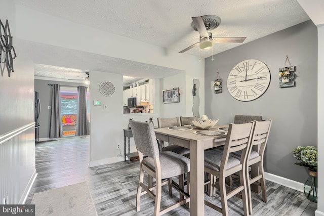 840 W Spring Meadow Ct, Edgewood, MD 21040 - dining room featuring ceiling fan, light wood-style flooring, and a textured ceiling