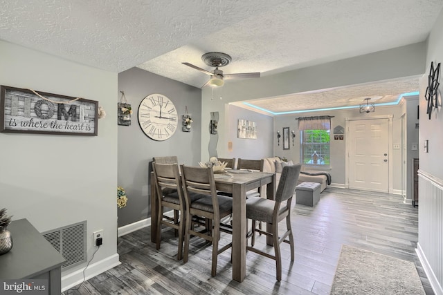 840 W Spring Meadow Ct, Edgewood, MD 21040 - dining room with wood finished floors, a ceiling fan, and a textured ceiling