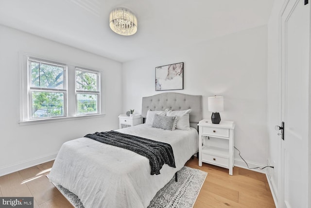 1539 K St SE, Washington, DC 20003 - bedroom with baseboards and light wood finished floors