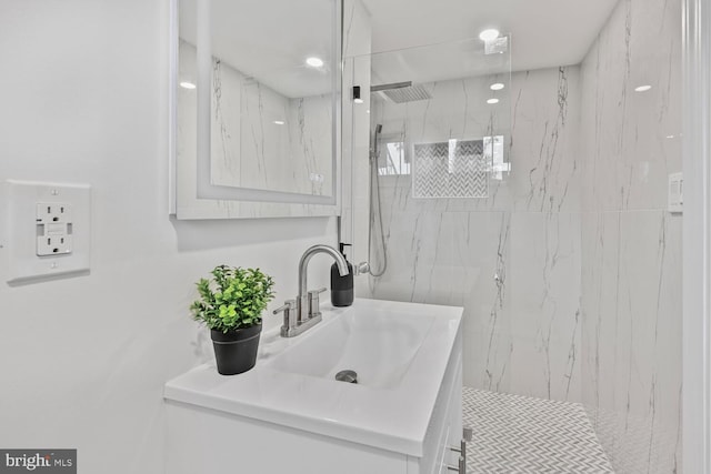 1539 K St SE, Washington, DC 20003 - bathroom with vanity and a marble finish shower