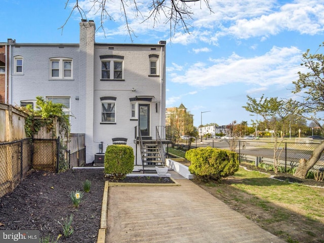 1539 K St SE, Washington, DC 20003 - back of house with brick siding and a chimney