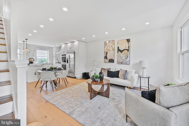 1539 K St SE, Washington, DC 20003 - living room with recessed lighting, stairs, and light wood-type flooring