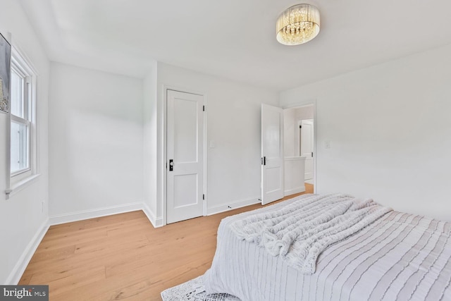 1539 K St SE, Washington, DC 20003 - bedroom with light wood finished floors and baseboards