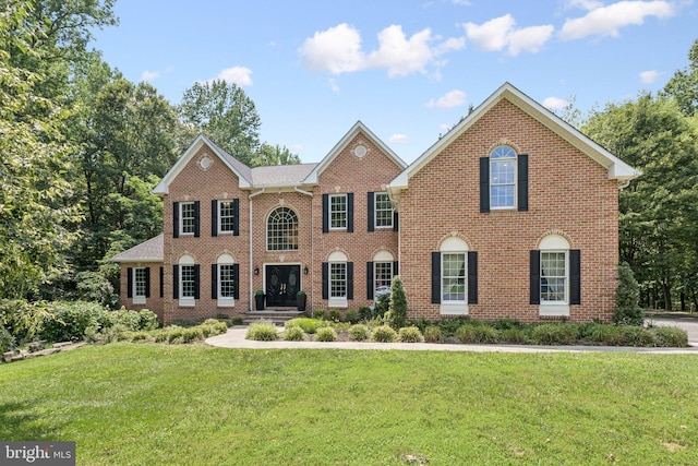 1508 Cornerstone Ct, Crownsville, MD 21032 - colonial-style house with brick siding and a front lawn