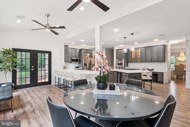1508 Cornerstone Ct, Crownsville, MD 21032 - dining space with a ceiling fan, french doors, plenty of natural light, light wood-style flooring, and recessed lighting