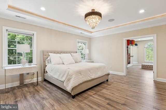 1508 Cornerstone Ct, Crownsville, MD 21032 - bedroom with a tray ceiling, ornamental molding, wood finished floors, a chandelier, and recessed lighting