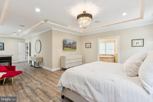 1508 Cornerstone Ct, Crownsville, MD 21032 - bedroom with a raised ceiling, wood finished floors, crown molding, a chandelier, and recessed lighting
