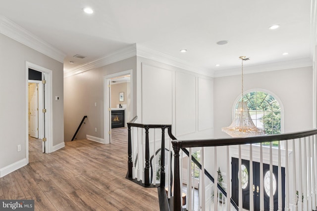 1508 Cornerstone Ct, Crownsville, MD 21032 - hall featuring an upstairs landing, wood finished floors, recessed lighting, and ornamental molding