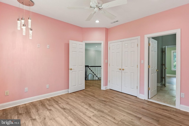 1508 Cornerstone Ct, Crownsville, MD 21032 - unfurnished bedroom with wood finished floors, recessed lighting, a closet, and ceiling fan