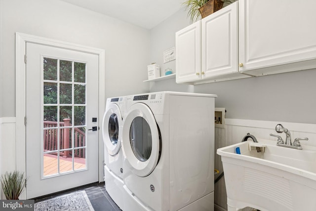 1508 Cornerstone Ct, Crownsville, MD 21032 - washroom with separate washer and dryer, cabinet space, a wainscoted wall, and dark tile patterned floors