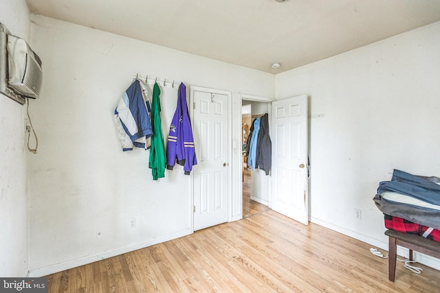 104 Elm Ave, Glen Burnie, MD 21061 - bedroom featuring wood finished floors and a wall mounted AC