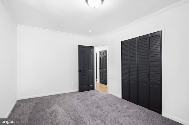 1013 Roxleigh Rd, Baltimore, MD 21286 - unfurnished bedroom featuring crown molding, carpet, and a closet