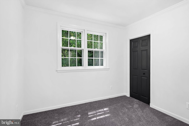 1013 Roxleigh Rd, Baltimore, MD 21286 - unfurnished room featuring dark colored carpet and crown molding
