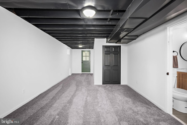 1013 Roxleigh Rd, Baltimore, MD 21286 - basement featuring carpet floors and baseboards