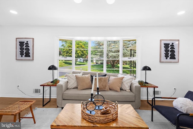 1013 Roxleigh Rd, Baltimore, MD 21286 - living area with healthy amount of natural light, recessed lighting, and wood finished floors