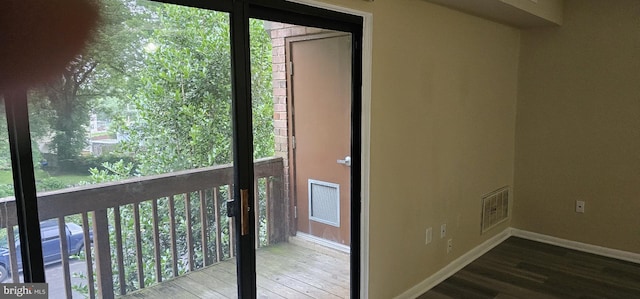 10725 W Dr Unit 301, Fairfax, VA 22030 - doorway to outside with wood finished floors and baseboards