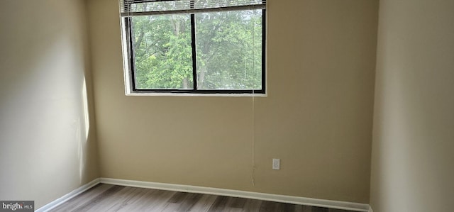 10725 W Dr Unit 301, Fairfax, VA 22030 - empty room with baseboards and wood finished floors