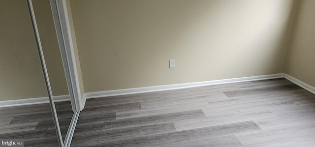 10725 W Dr Unit 301, Fairfax, VA 22030 - unfurnished room featuring wood finished floors and baseboards