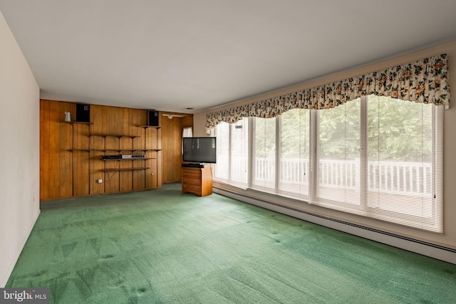 60 Ridge View Dr, Leola, PA 17540 - unfurnished living room with a baseboard heating unit, light colored carpet, and wooden walls