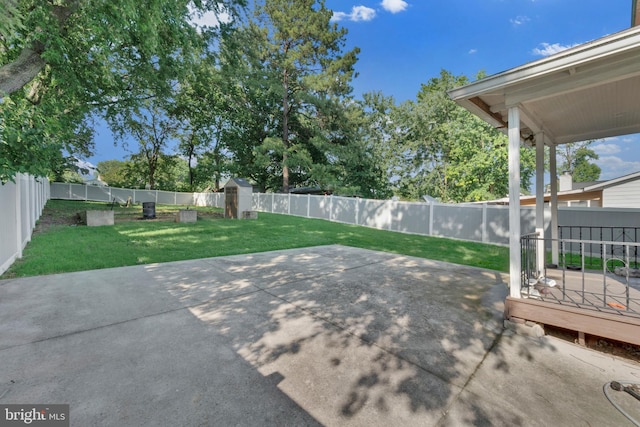 370 Nicholson Rd, Baltimore, MD 21221 - fenced backyard with a patio area and a shed