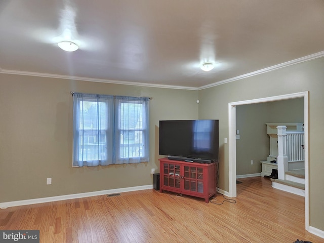 370 Nicholson Rd, Baltimore, MD 21221 - living area with wood finished floors, crown molding, and stairway