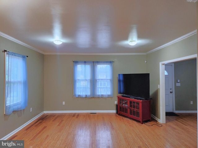 370 Nicholson Rd, Baltimore, MD 21221 - unfurnished living room with plenty of natural light, wood finished floors, and crown molding