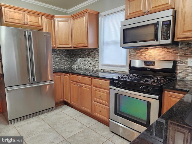370 Nicholson Rd, Baltimore, MD 21221 - kitchen featuring stainless steel appliances, crown molding, light tile patterned floors, dark stone counters, and tasteful backsplash