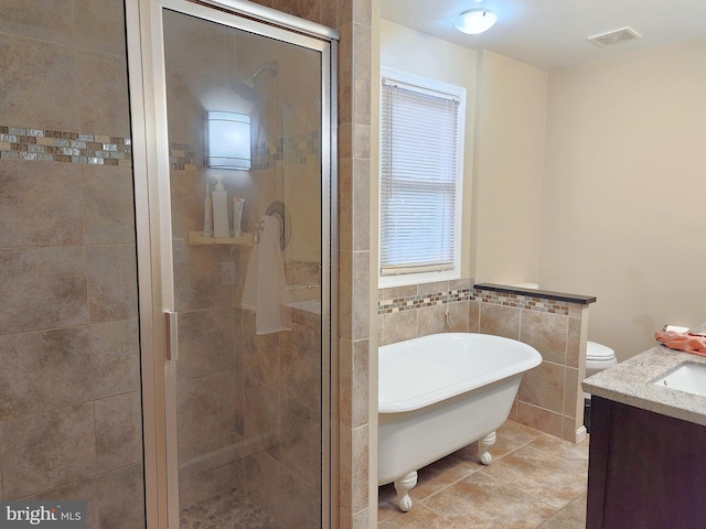 370 Nicholson Rd, Baltimore, MD 21221 - full bathroom with a freestanding bath, a stall shower, vanity, and tile patterned floors