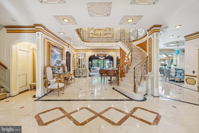 423 Seneca Rd, Great Falls, VA 22066 - community lobby with stairway, ornamental molding, and recessed lighting