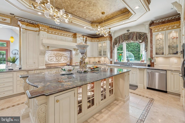 423 Seneca Rd, Great Falls, VA 22066 - kitchen featuring stainless steel dishwasher, inlaid floor details, a chandelier, a raised ceiling, and cream cabinets