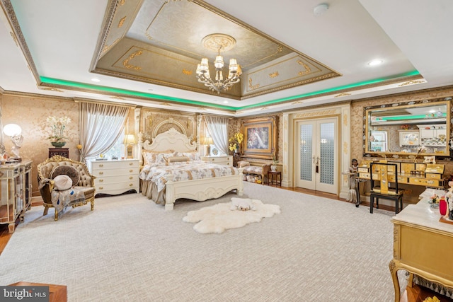 423 Seneca Rd, Great Falls, VA 22066 - bedroom with a tray ceiling, a chandelier, wallpapered walls, access to exterior, and french doors