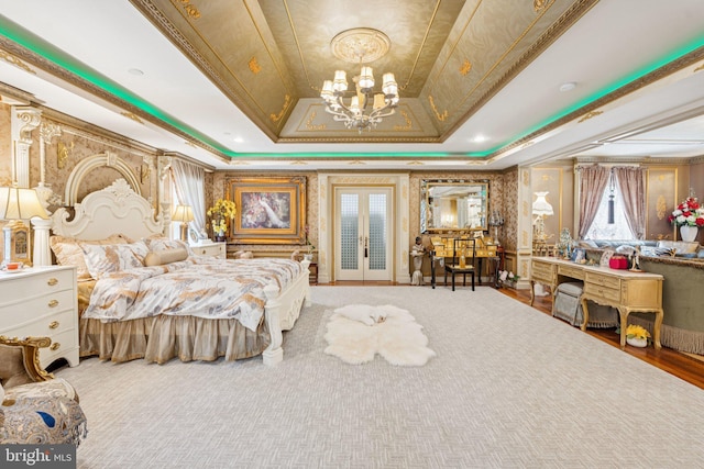 423 Seneca Rd, Great Falls, VA 22066 - bedroom featuring a raised ceiling, a chandelier, crown molding, and french doors