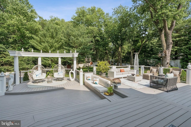 423 Seneca Rd, Great Falls, VA 22066 - wooden deck with outdoor lounge area and view of wooded area