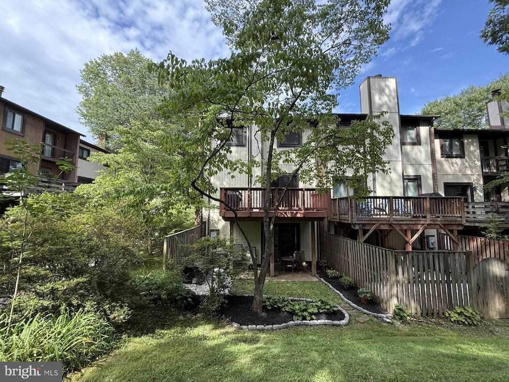 5818 Jacksons Oak Ct, Burke, VA 22015 - back of house featuring a deck and a chimney