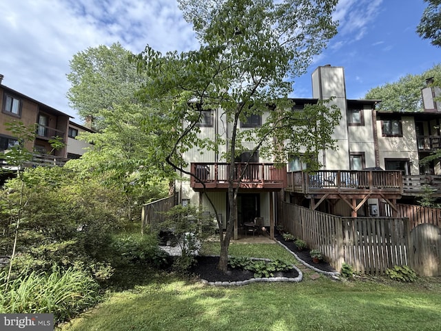 5818 Jacksons Oak Ct, Burke, VA 22015 - back of house featuring a deck and a chimney