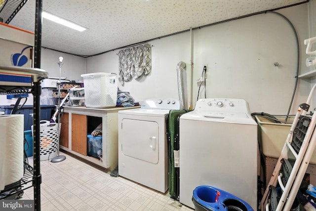 2205 Culpeper Dr, Woodbridge, VA 22191 - laundry room with washer and dryer and tile patterned floors