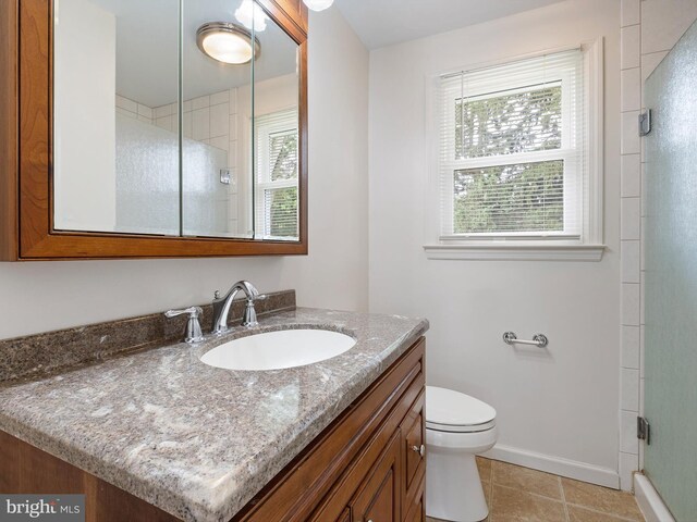 110 Wembley Rd, Wilmington, DE 19808 - bathroom with vanity, a shower stall, and tile patterned floors