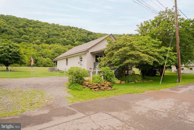 108 W Center St, Kitzmiller, MD 21538 - view of side of home with driveway and a metal roof