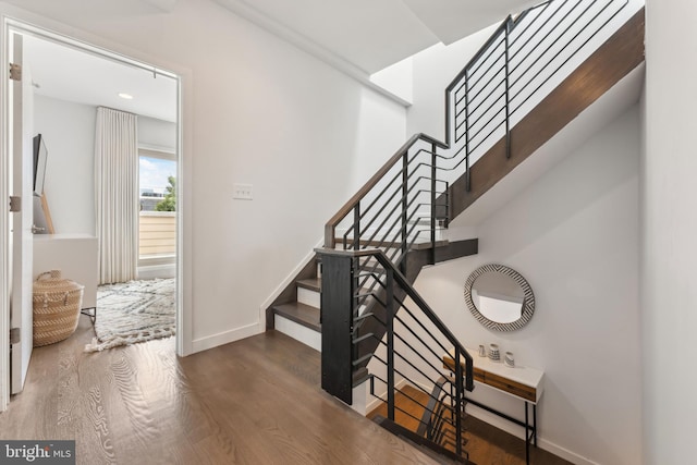 2228 Carpenter St, Philadelphia, PA 19146 - stairs featuring wood finished floors and baseboards