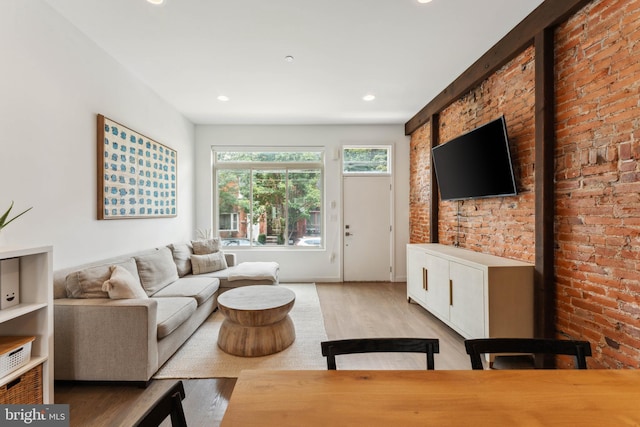 2228 Carpenter St, Philadelphia, PA 19146 - living room with light wood-style flooring, recessed lighting, and brick wall