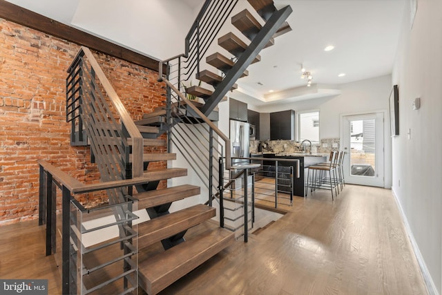 2228 Carpenter St, Philadelphia, PA 19146 - staircase featuring wood finished floors and recessed lighting