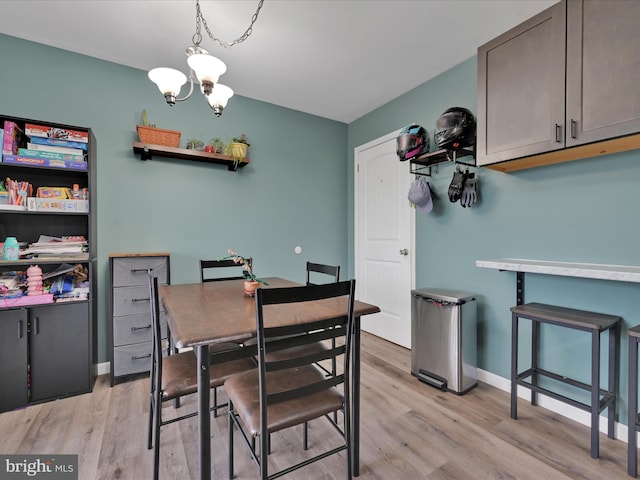 418 High St, Schuylkill Haven, PA 17972 - dining area featuring a chandelier and light wood-style floors