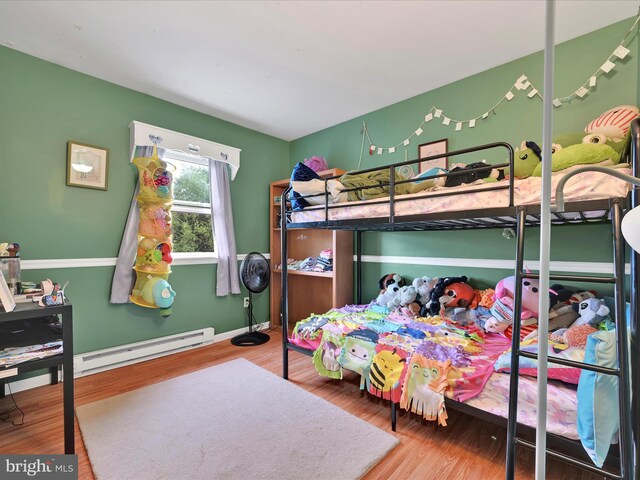418 High St, Schuylkill Haven, PA 17972 - bedroom with baseboard heating and wood finished floors