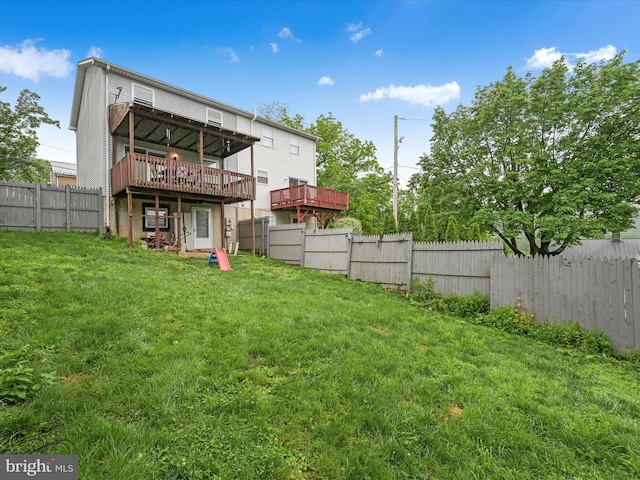 418 High St, Schuylkill Haven, PA 17972 - back of property with a deck and a fenced backyard